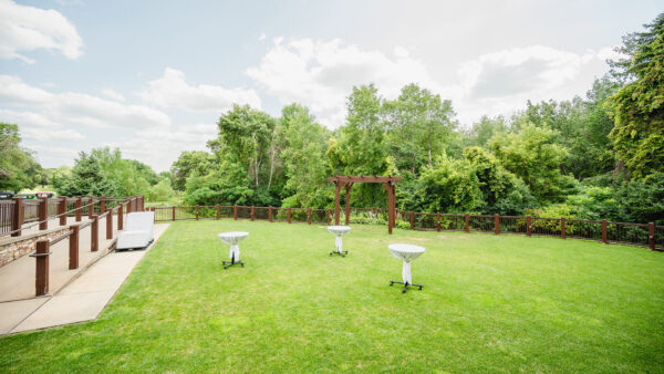 white tables set up in a serene landscape