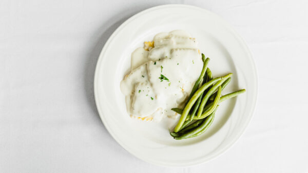 dinner plate of green beans and pasta