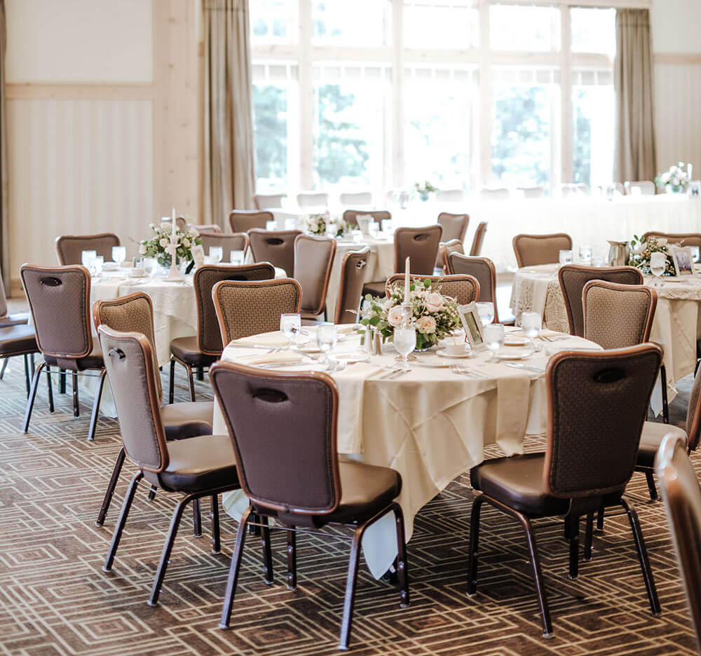 tables and chairs set up for events in the grand ballroom at Bunker Hills Event Center