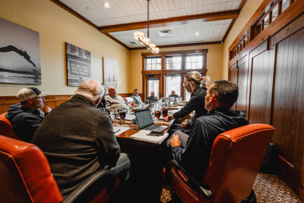 people gathered in the meeting room at bunker hills