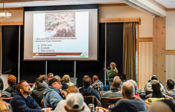 person giving presentation on projector at Bunker Hills