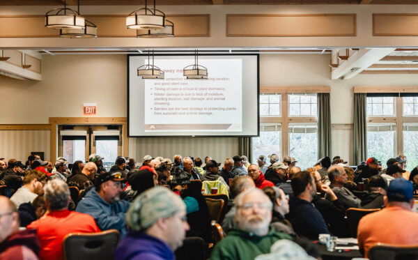crowd watching a presentation on projector at Bunker Hills