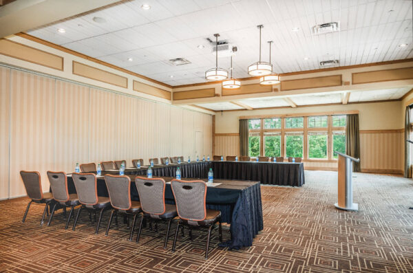 tables and chairs set up for presentation in the North Ballroom at Bunker Hills Event Center