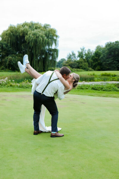 Bride and groom posing for photo
