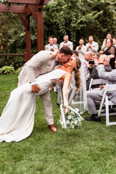 Bride and groom posing for wedding photos