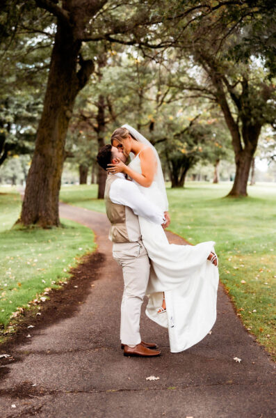 couple posing for wedding photos