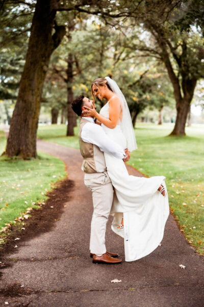couple posing for wedding photos