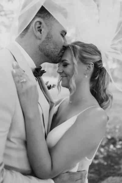 couple posing for wedding photos
